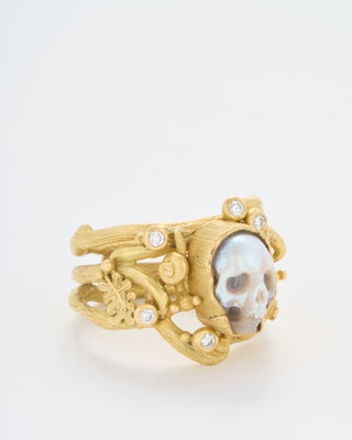 carved pearl fairy skull ring