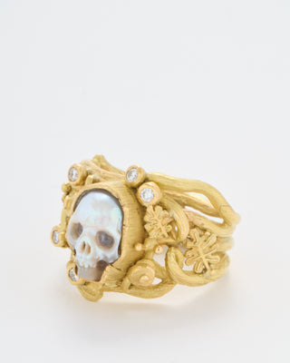 carved pearl fairy skull ring