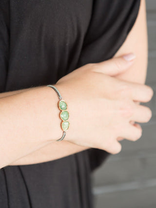 triple orbit emerald bracelet