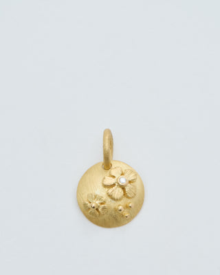 18k gold coin pendant with flowers