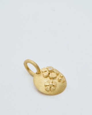 18k gold coin pendant with flowers