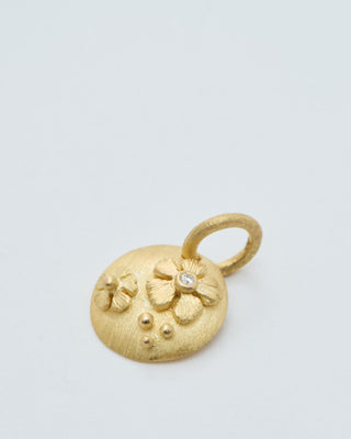 18k gold coin pendant with flowers