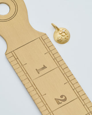 18k gold coin pendant with flowers