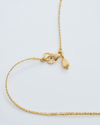 18kt gold night seed and lilac on cord