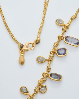 18kt gold the middle path 15 stone necklace on cord