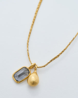 18kt gold the middle path drop and spinel on cord