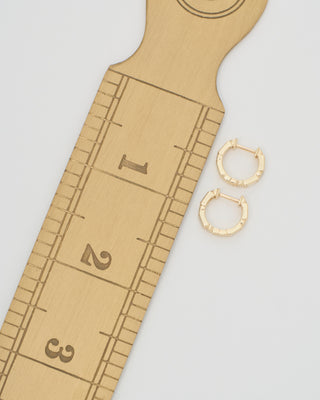 baguette and round bezel huggie hoops
