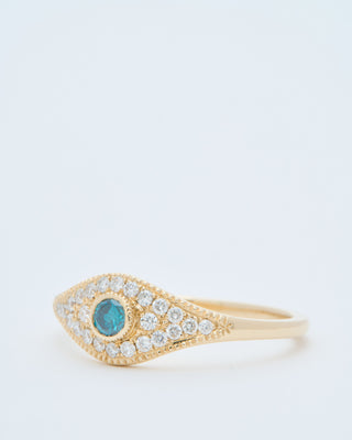blue diamond center pave eye ring