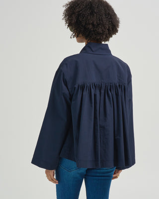 funnel neck jacket with pleated back