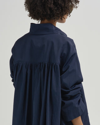 funnel neck jacket with pleated back