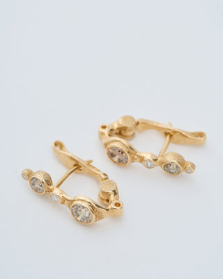 gold and brown diamond earrings