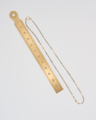 gold and grey diamond round beaded necklace with clasp