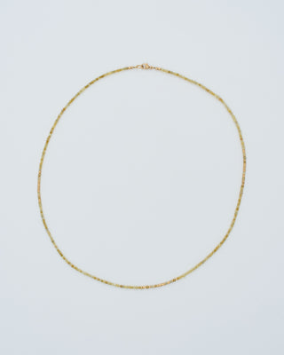 gold and yellow diamond round beaded necklace