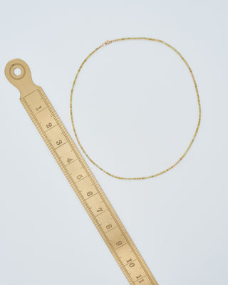 gold and yellow diamond round beaded necklace