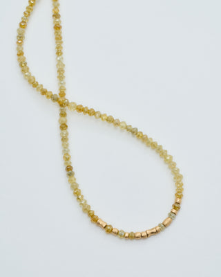 gold and yellow diamond round beaded necklace