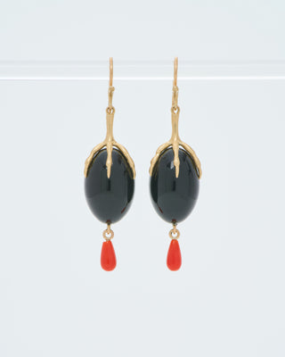 gold claw with onyx qual egg earrings