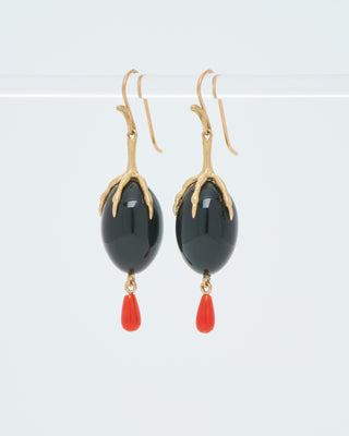 gold claw with onyx qual egg earrings