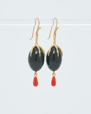 gold claw with onyx qual egg earrings