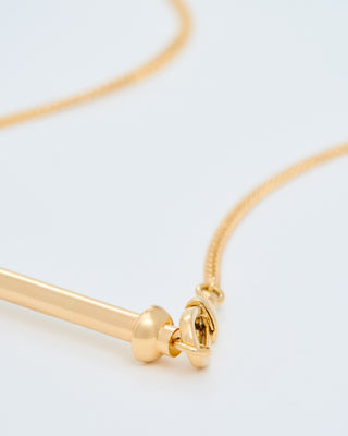 gold mini candy cane pendant on gourmette chain