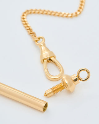 gold mini candy cane pendant on gourmette chain