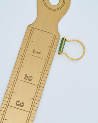 green tourmaline east west ring