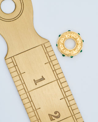 hag stone mini pendant w/ emeralds