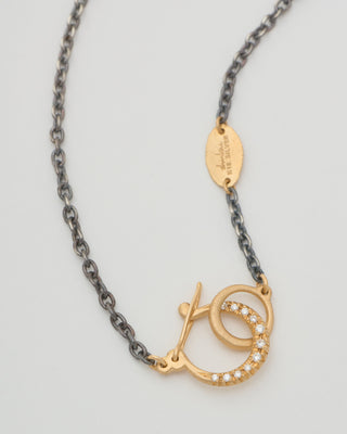 hung silver necklace with diamonds