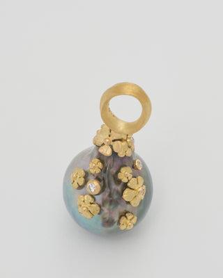 large pearl pendant with flowers