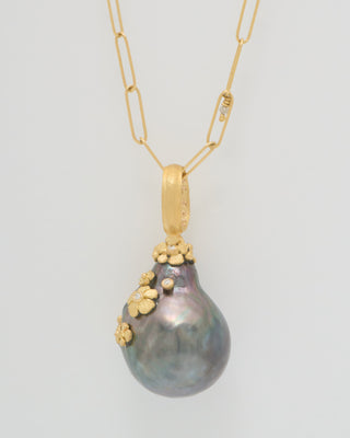 large pearl pendant with flowers