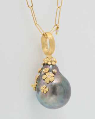 large pearl pendant with flowers