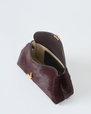 mini t-lock pony hair clutch