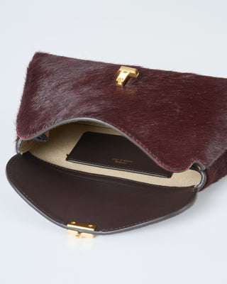 mini t-lock pony hair clutch