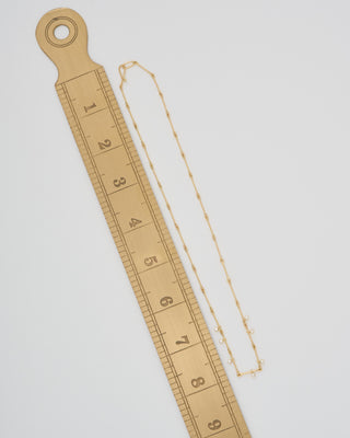 needle eye necklace with diamonds