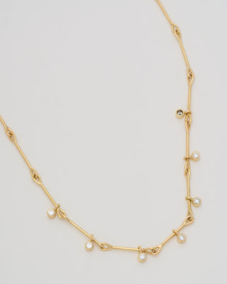 needle eye necklace with diamonds