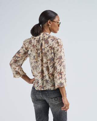 nina ruffle button front blouse