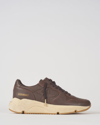 running sole leather upper toe star heel and spur sneaker