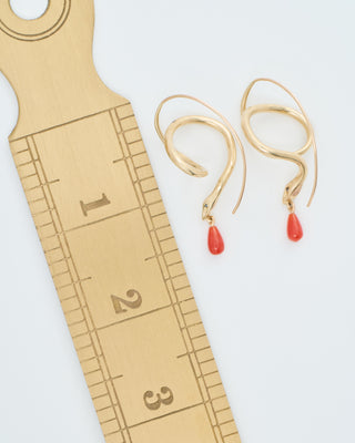 serpent earrings with coral drops