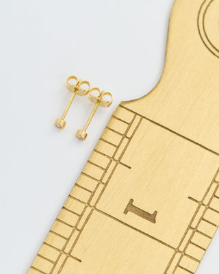 teeny 1pt diamond studs