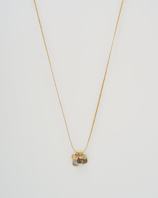 the middle path 7 stone pendant necklace