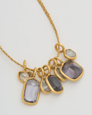 the middle path 7 stone pendant necklace