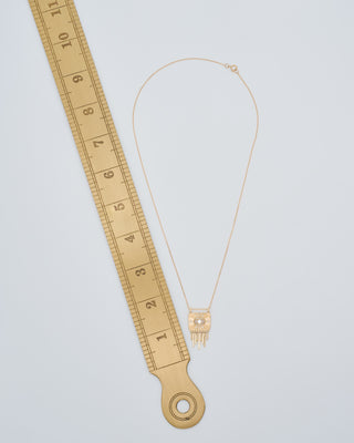 white sapphire eye plate necklace