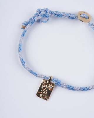 adjustable macrame bracelet with flower tag - gold