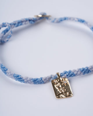 adjustable macrame bracelet with flower tag - gold