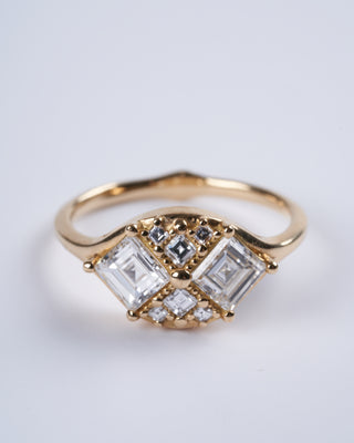 step cut engagement ring with eight square - gold