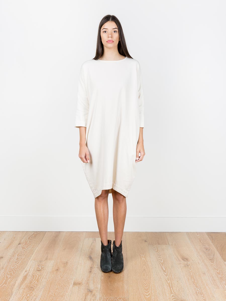 cream dress with black boots So cute. Oversized cream sweater dress + long black boots #casual #winter #fall #streetstyle