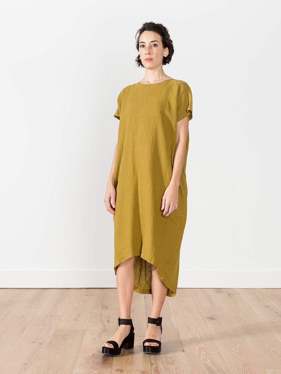 Black Crane Linen Pleated Cocoon Dress in Mustard Black Crane Linen Pleated Cocoon Dress in Mustard