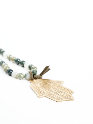 green rutilated necklace - bronze hamsa