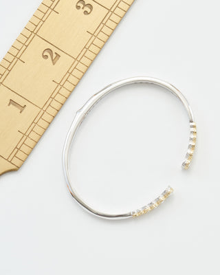 classic two-toned open bezel set diamond bangle