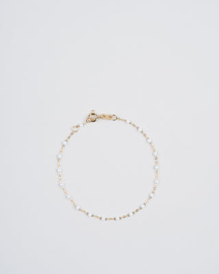 white bead bracelet - yellow gold