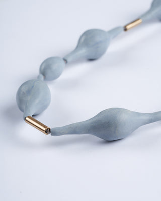 sea bean clay necklace - light blue